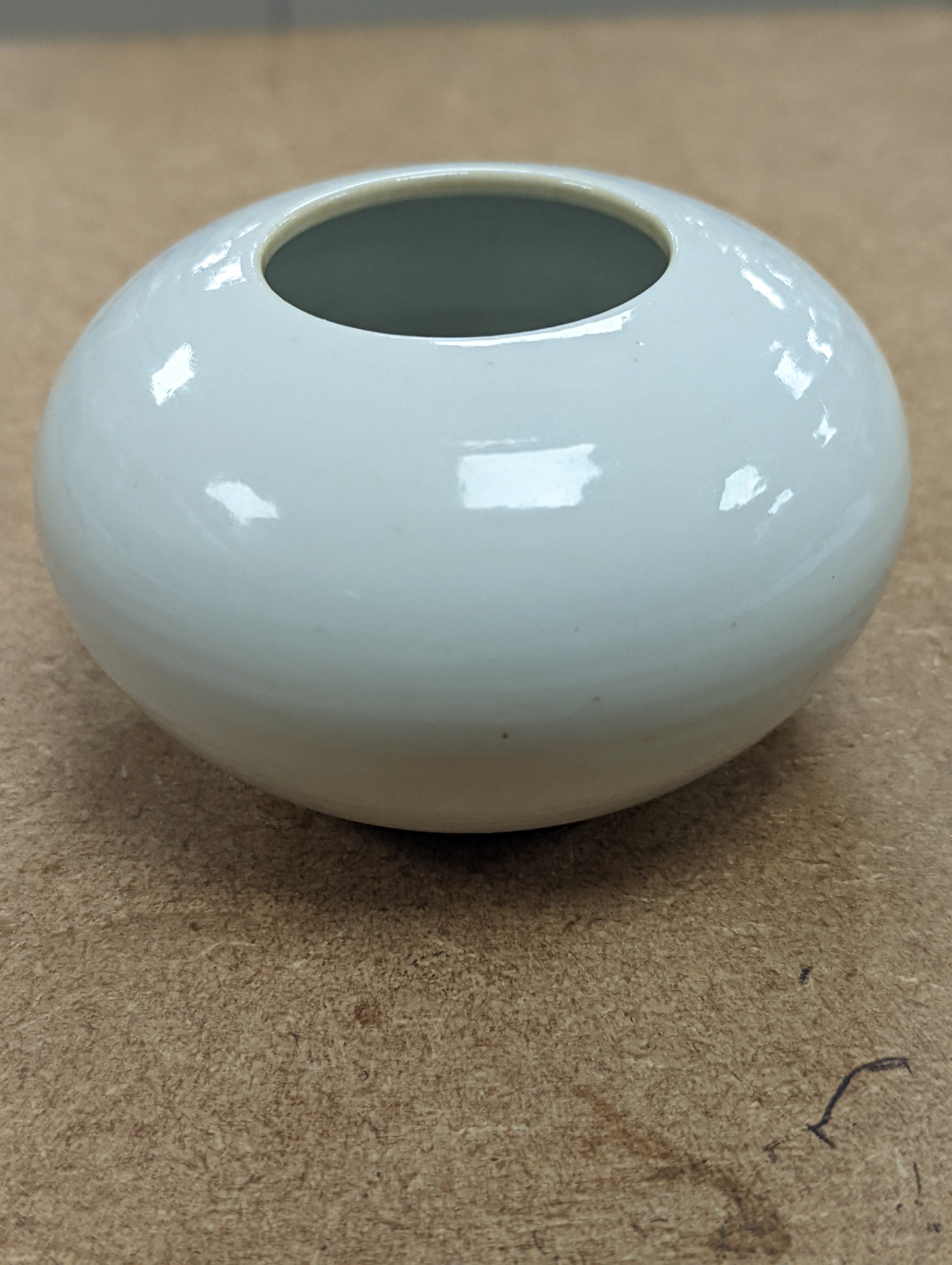 A Chinese white glazed water pot and a similar cup (2)